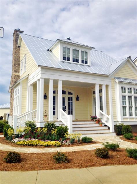 metal roof color for yellow house|yellow house with charcoal roof.